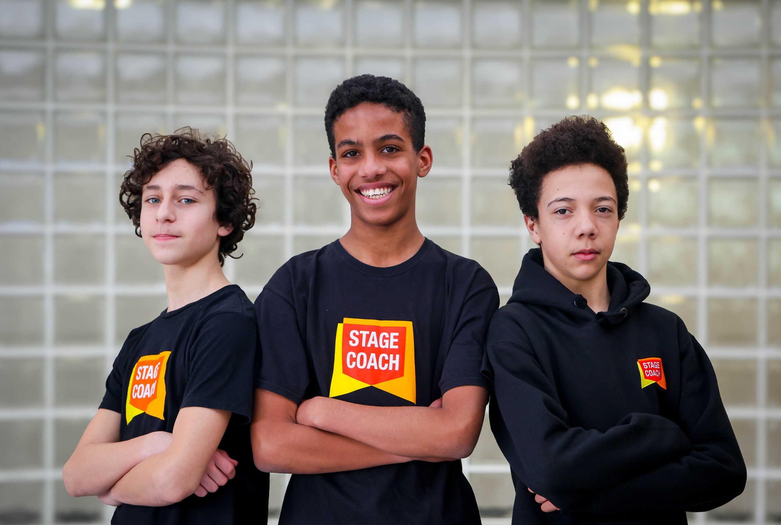 Three smiling Main Stages teens in Stagecoach T-shirts