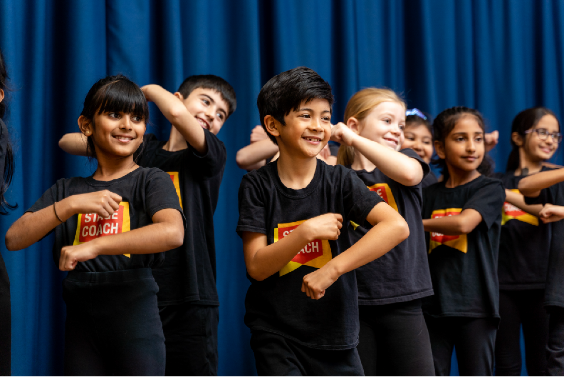 Stagecoach students taking part in singing, dancing and acting classes.